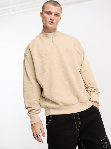 ASOS DESIGN – Oversize-Baseball-Sweatshirt aus beigem Pikee mit kurzem Reißverschluss