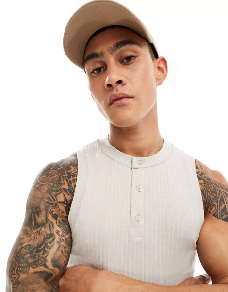 ASOS DESIGN muscle fit vest with henley neck in stone