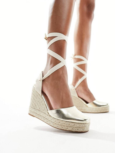 schuh closed toe wedge espadrilles in gold