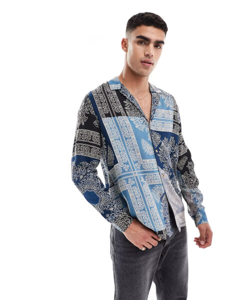 ASOS DESIGN relaxed deep revere shirt in spliced bandana print in blue