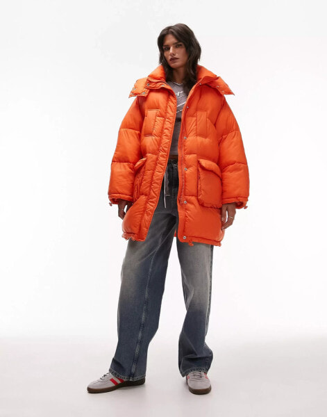 Topshop oversized hooded puffer jacket with front pockets in bright orange