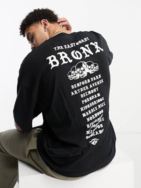 ASOS DESIGN oversized t-shirt in black with back text print