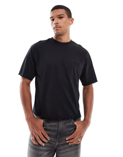 ASOS DESIGN relaxed boxy t-shirt with raw edge pocket in black