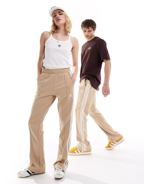 adidas Originals Adicolour flare tracksuit bottoms in beige