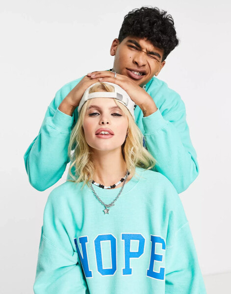 Reclaimed Vintage inspired unisex nope crew neck sweat in turquoise