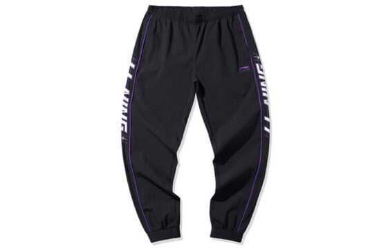 Спортивные брюки LI-NING AYKQ217-2 для мужчин - черные, с логотипом на штанине
