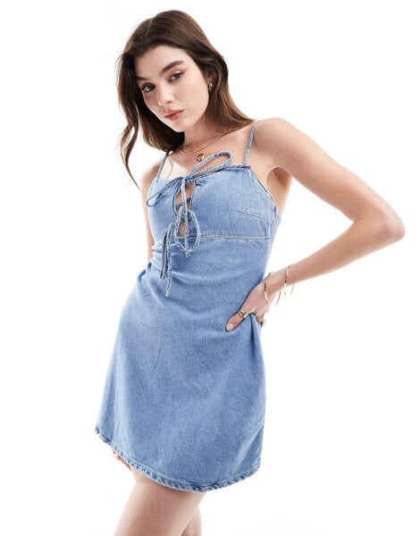 Bershka tie front denim mini dress in blue wash