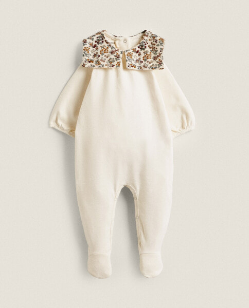 Floral print fabric children's romper suit with collar detail