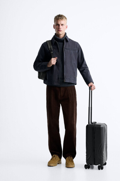 Rigid carry-on suitcase