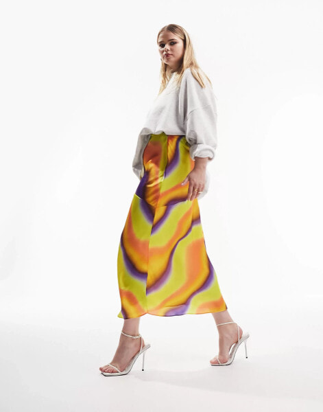 ASOS DESIGN Curve satin bias midi skirt in bright tie dye print