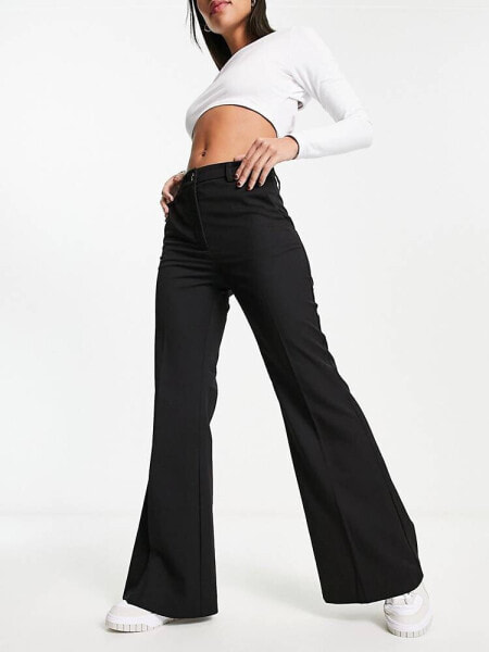 Monki tailored flared trousers in black