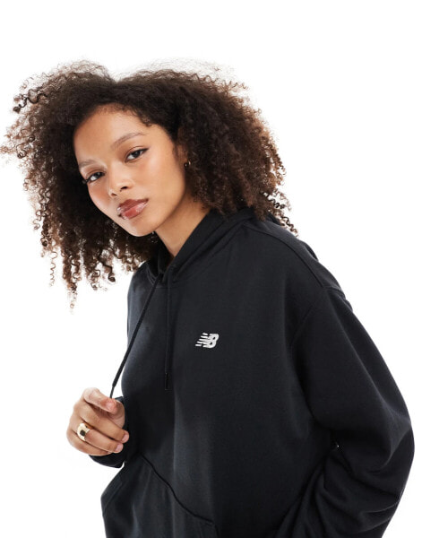 New Balance Sport essentials french terry hoodie in black