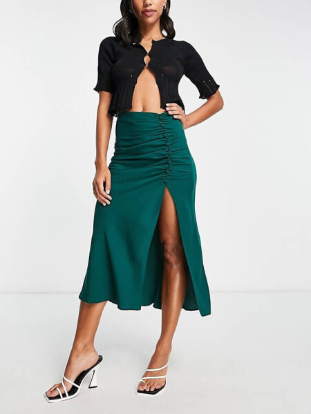 ASOS DESIGN midi skirt with ruched side and button detail in dark green 