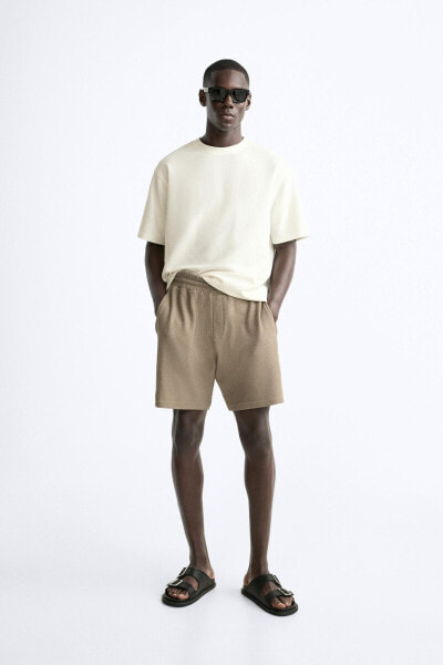 Textured mesh bermuda shorts