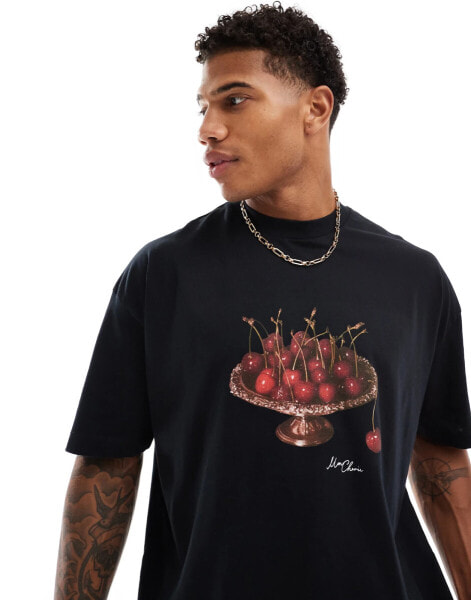 ASOS DESIGN oversized t-shirt in black with cherry chest print