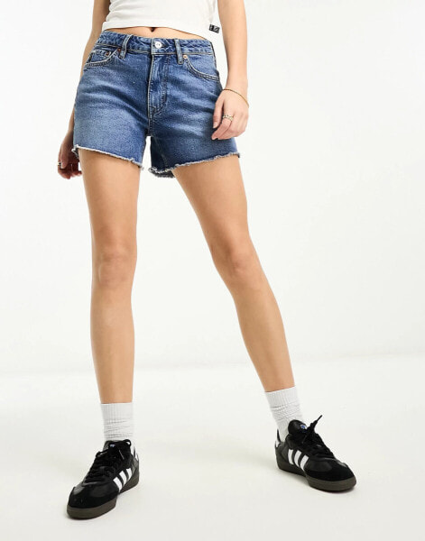 Superdry vintage mid rise slim shorts in mid wash