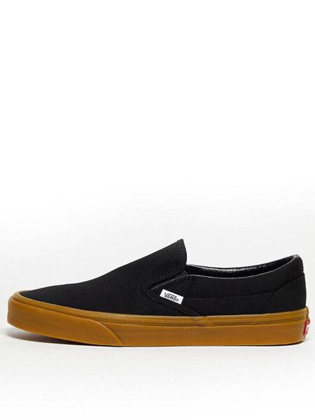 Vans classic slip on gum sole trainers in black