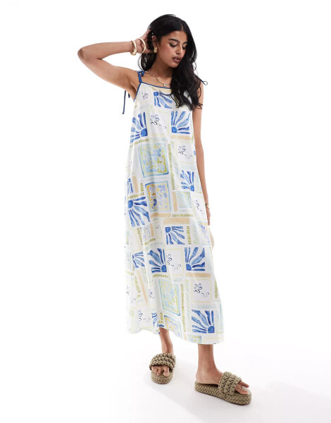 ASOS DESIGN strappy trapeze maxi dress with contrast straps in summer tile print