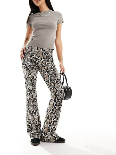 Noisy May high waisted flared trousers in snake print