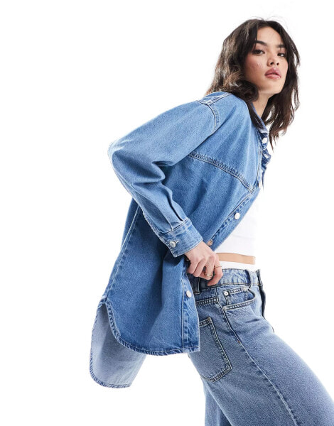 Bershka longline oversized denim shirt in mid blue