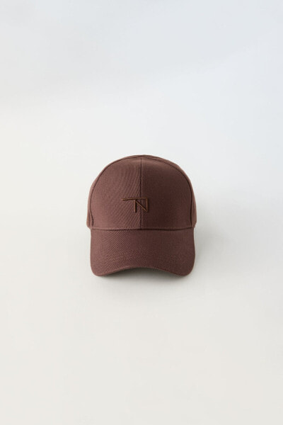 True neutrals embroidered peak cap
