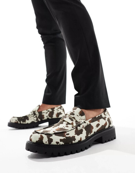 Truffle Collection chunky penny loafers in cow print