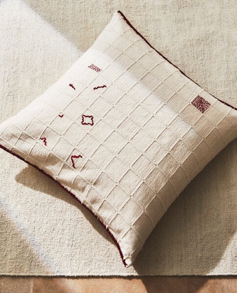 Cushion cover with geometric embroidery