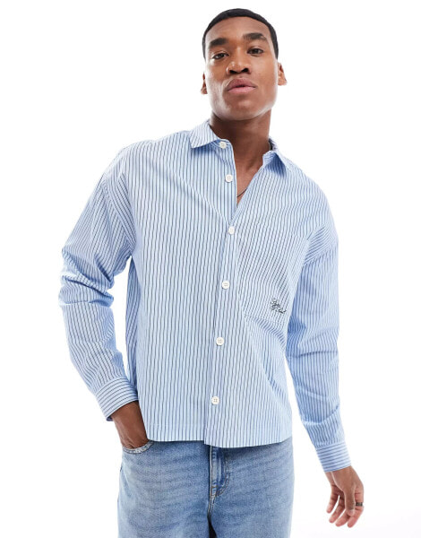 ASOS DESIGN oversized boxy shirt with embroidery in blue stripe