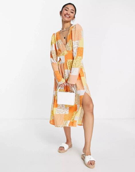 Monki – Langärmliges Midikleid in Orange mit Patchwork-Blumenmuster