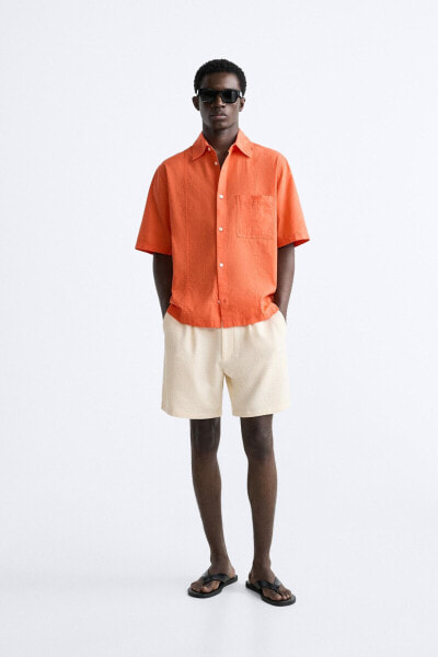 Pleated bermuda shorts