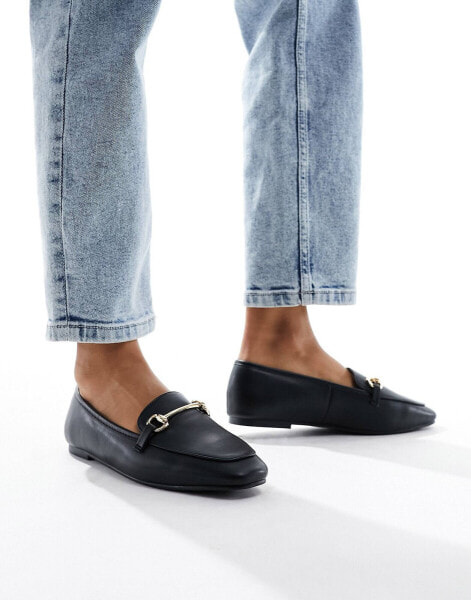 London Rebel knot metal trim loafers in black