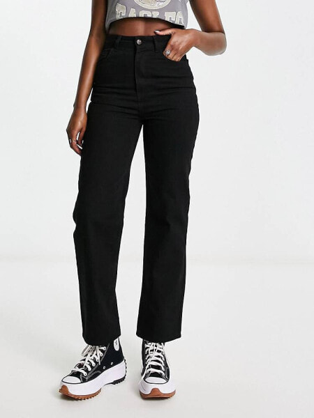 Reclaimed Vintage high waist slim leg jean in washed black