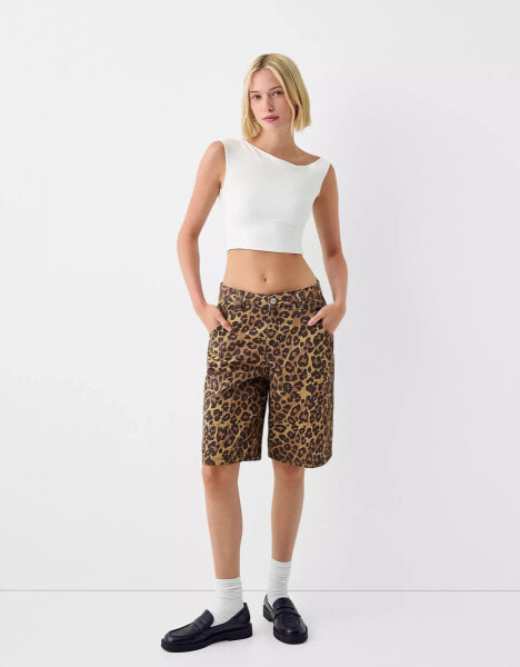 Bershka baggy longline shorts in leopard print