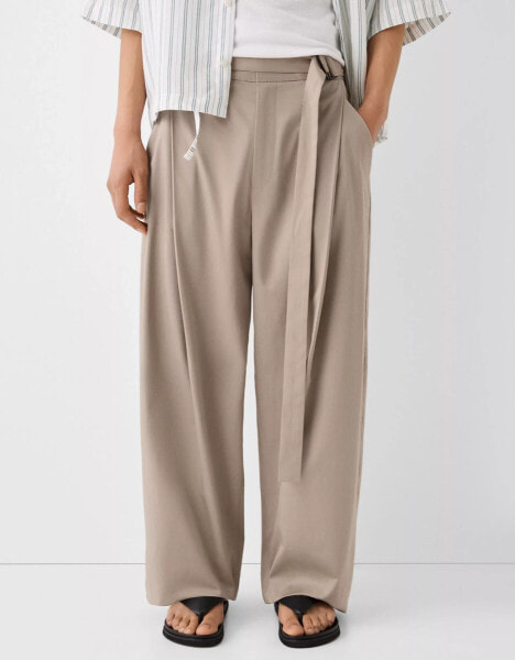 Bershka Collection baggy leg tailored trousers in brown