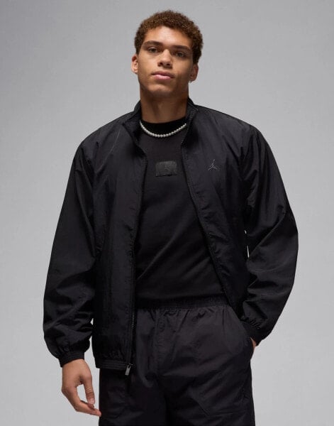 Jordan Essentail woven wind jacket in black