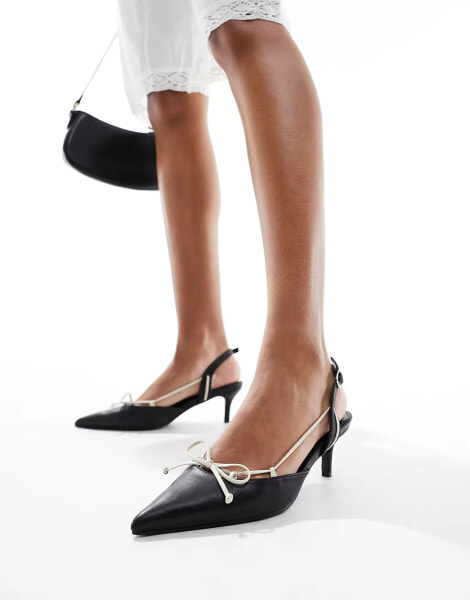 Public Desire Rai pointed heeled mule in black and cream