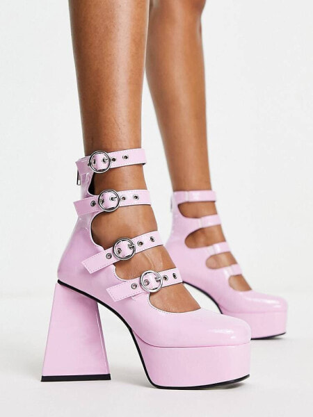 Lamoda True Romance multi buckle platform shoes in pink patent