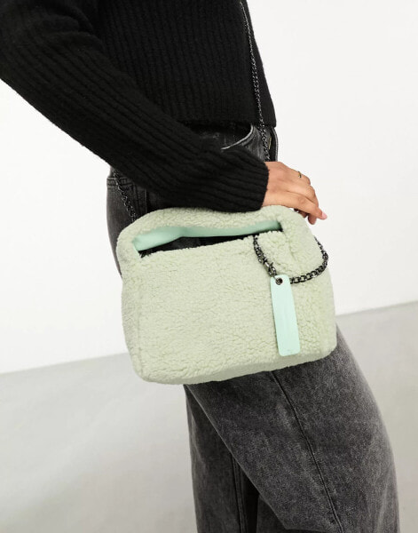 Claudia Canova mini grab bag with cross body strap in mint faux fur