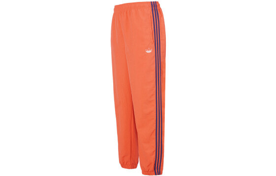 Брюки adidas Originals спортивные мужские Pant оранжевые DV3141