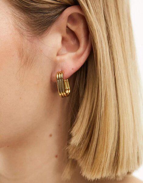 Lost Souls stainless steel oval hoops in gold