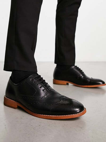 Office meanest brogues in black leather