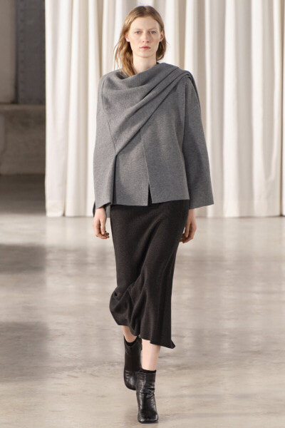 Short knit coat with asymmetric scarf