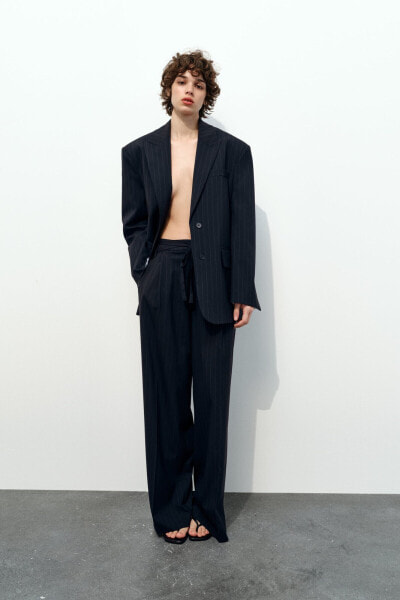 Pinstripe trousers with belt