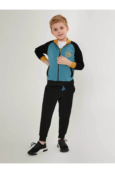 Спортивный костюм RolyPoly для мальчиков Петроль 9-14 лет