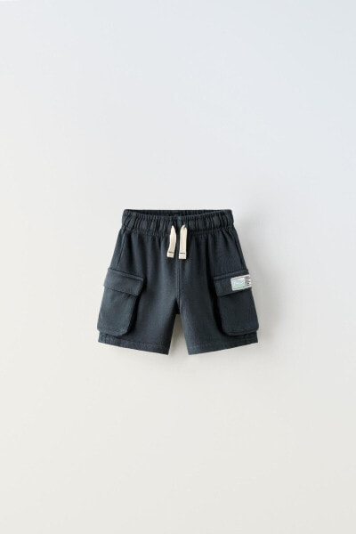 Cargo bermuda shorts with label