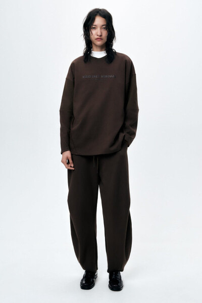 Plush jogger trousers with pleats