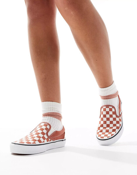 Vans classic slip on trainers in burnt orange and white checkerboard