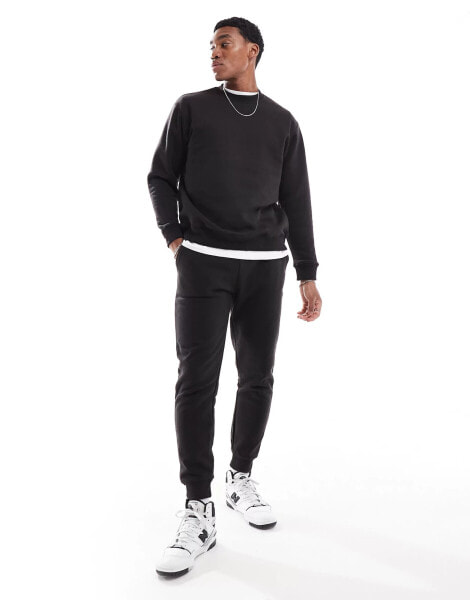 DTT crew neck sweatshirt & jogger tracksuit set in black