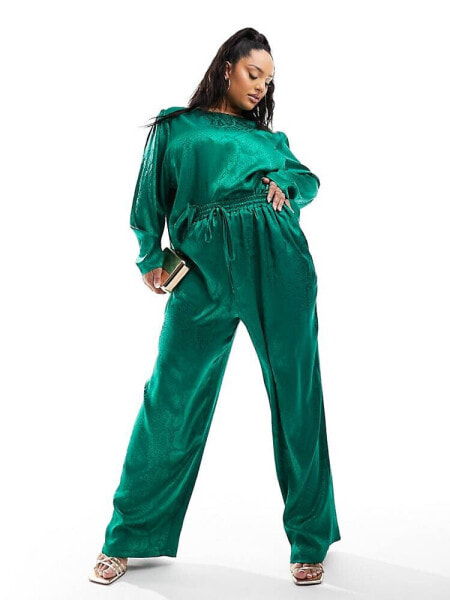 Flounce London Plus satin floaty trousers in emerald green co ord