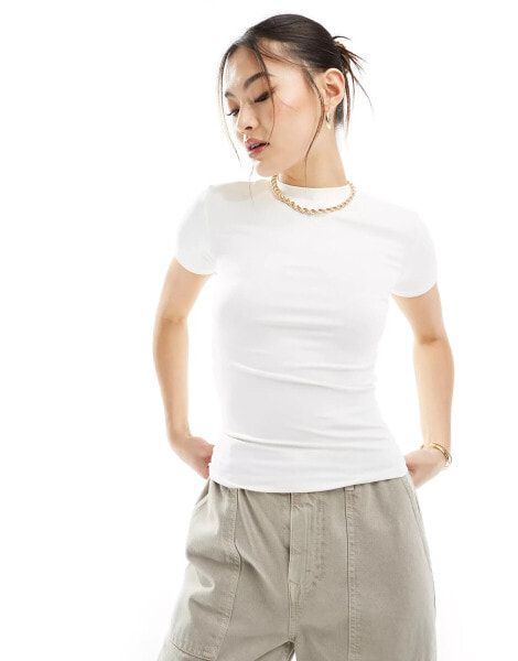 The Couture Club soft touch emblem baby t-shirt in off white